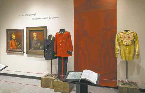 From left, portraits of Chief William Berens and Chief Jacob Berens by Marion Nelson Hooker; coat worn by William Berens, given to him by the government; coat given to Jacob Berens on the occasion of signing Treaty No. 5 in 1875; embroidered moose-hide jacket made by Nancy Berens.
