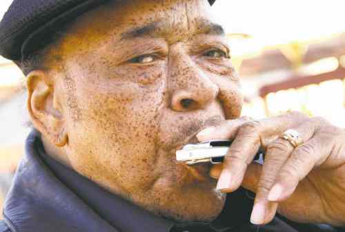 Christopher Durst photo
Mississippi-born James Cotton learned to play harmonica from Sonny Boy WIlliamson II.