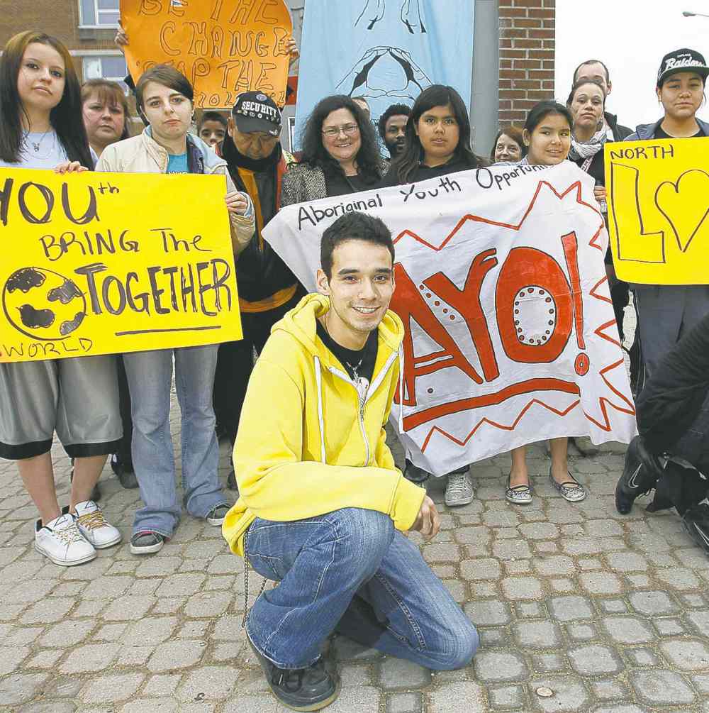 Trevor Hagan / Winnipeg Free Press files
Michael Champagne (front) leads a rally against violence at the bell tower on Selkirk Avenue in 2012.