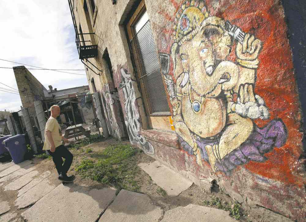 Murals cover the Red Road Lodge front and back. (Phil Hossack / Winnipeg Free Press)