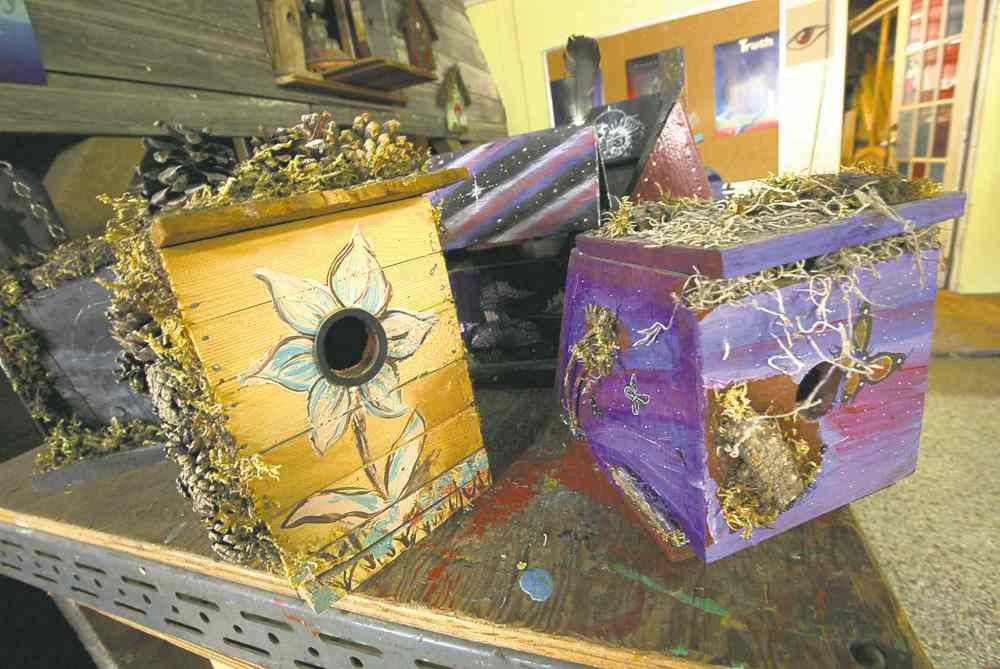 Decorated birdhouses made at the Red Road Lodge. (Phil Hossack / Winnipeg Free Press)