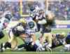 Winnipeg Free Press
Winnipeg Blue Bombers' Don Unamba (41) can't stop Toronto Argonauts' Curtis Steele (29) flying in for the touchdown during the first half of their CFL pre-season game in Winnipeg Monday.