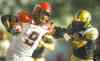 Jeff Mcintosh / The Canadian Press
Stampeders' running back Jon Cornish ran roughshod over the Bombers defence Saturday, including this straight-arm escape of Demond Washington.