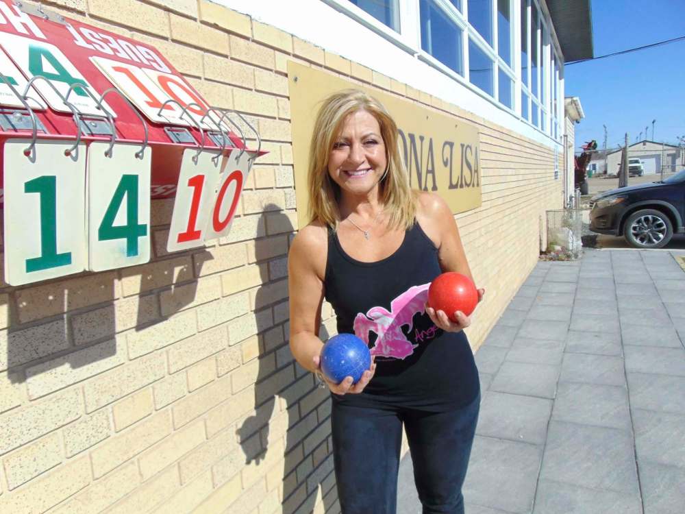 MAUREEN SCURFIELD / WINNIPEG FREE PRESS
Marilena Moccia is gearing up for another action-packed bocce season on Corydon Avenue.