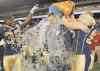 CP
John Woods / The Canadian Press
Winnipeg Blue Bombers Nic Grigsby (32) and Jake Thomas help Mike O�Shea celebrate his first win as their new head coach.