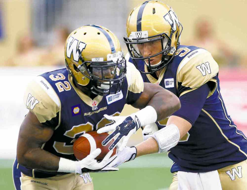 CP
John Woods / the canadian press files
Winnipeg Blue Bombers running back Nic Grigsby (left) motored for 122 yards on 21 carries and caught two passes for 17 yards Thursday.