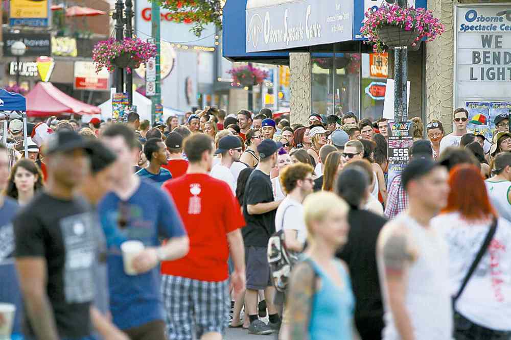 Winnipeg Free Press
John Woods / Winnipeg Free Press files
ABOVE: A big portion of Osborne Village is sealed off for a big street party every Canada Day.