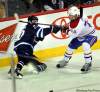 Phil Hossack / Winnipeg Free Press
Winnipeg Jets' Chris Thorburn goes down in the corner and delivers a stick to the face and neck of Montreal Canadiens' Alexei Emelin during second-period action Thursday at the MTS Centre. Thorburn drew a high-sticking four-minute penalty on the play.