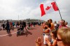 Spectators look on as veterans during the commemorations to honor Allied soldiers killed 70-years ago in a failed World War II invasion, take place in front the sea, in Dieppe, northern France, Sunday Aug. 19, 2012. Some 1,400 soldiers were killed in 