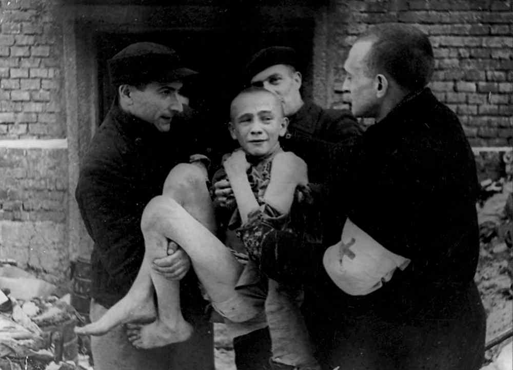 M. Redkin / courtesy of the MacLaren Art Centre/Photrocity
In one of the photographs on display as part of Photrocity, Ivan Dudnik, a 15-year-old Russian, is carried at Auschwitz in 1945.