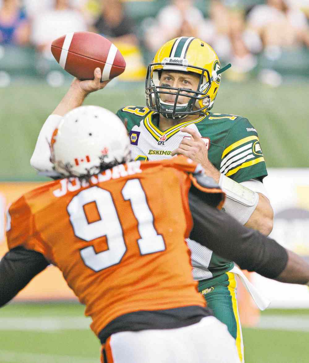 Jason Franson / the canadian press files
Eskimos QB Mike Reilly absorbed some heavy punishment and many losses in 2013, but has rebounded superbly in 2014.