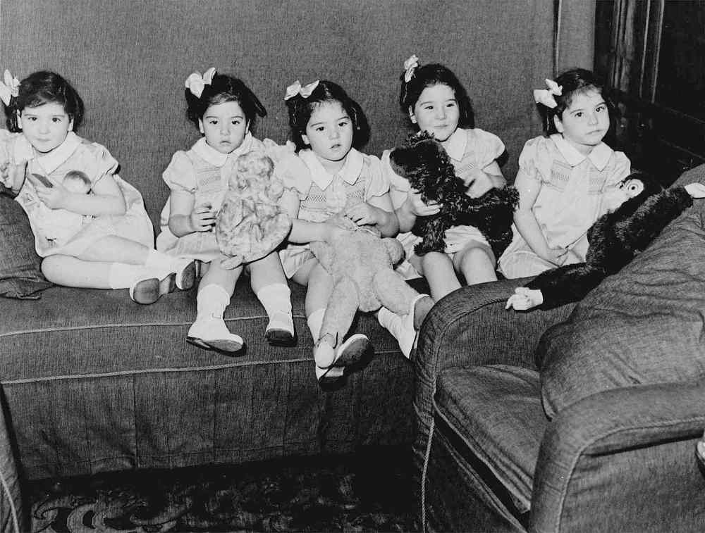 CP
FILE--The Dionne quintuplets arev shown in their train car, on trip to Toronto in this 1939 photo. (CP PHOTO/National Archives of Canada)