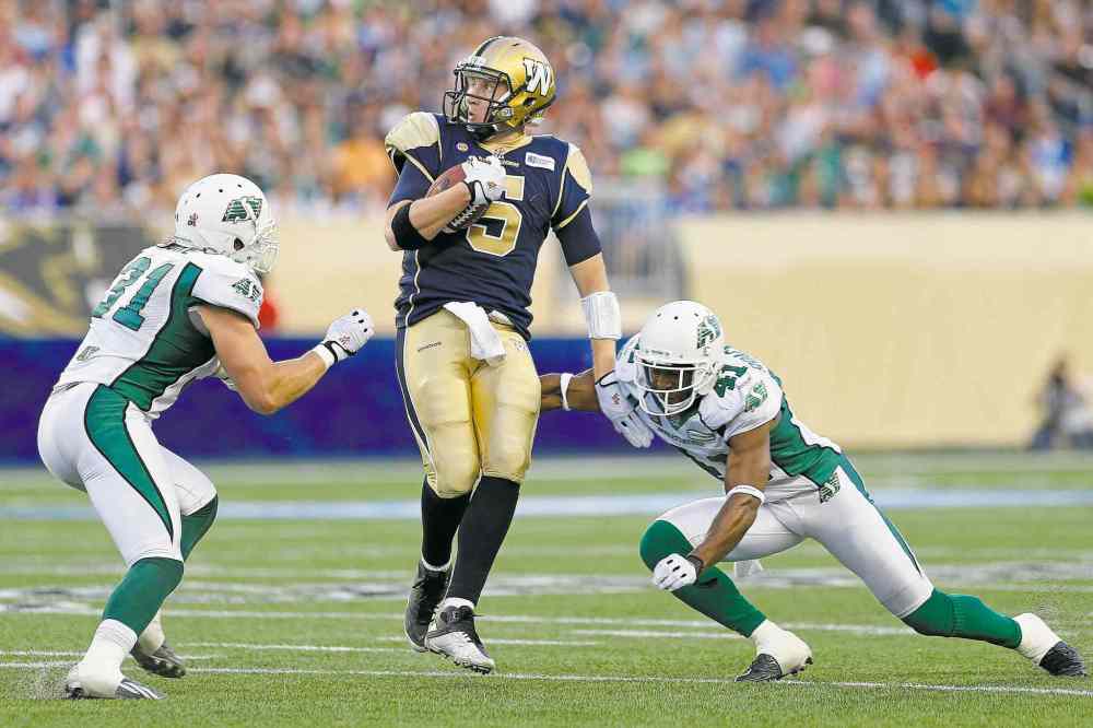 CP
John Woods / THE CANADIAN PRESS files
Winnipeg Blue Bombers quarterback Drew Willy was facing steady pressure from Saskatchewan defenders Thursday night at Investors Group Field.