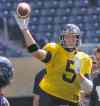 KEN GIGLIOTTI / WINNIPEG FREE PRESS
Quarterback Drew Willy fires the football at practice Tuesday.
