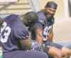 JOE BRYKSA / WINNIPEG FREE PRESS
Bryant Turner (right) jokes around with fellow defensive lineman Kashawn Fraser during a break in practice at Investors Group Field Wednesday.