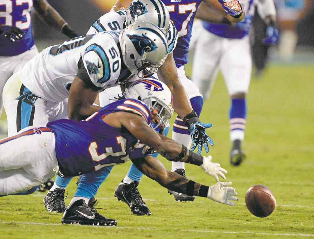 Tribune Media MCT
David T. Foster III / Charlotte Observer / MCT
Bombers coach Mike O�Shea doesn�t know if there would be a spot on the Blue and Gold for Alex Hall (50), now that the club�s former sack leader has been cut by the Carolina Panthers.
