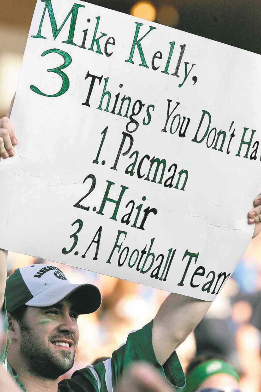CP
A Saskatchewan Roughriders fan sends a message to Winnipeg Blue Bombers head coach Mike Kelly late in second half CFL action in Winnipeg, Sunday, September 13, 2009. Saskatchewan Roughriders defeated the Winnipeg Blue Bombers 55-10. THE CANADIAN PRESS/John Woods