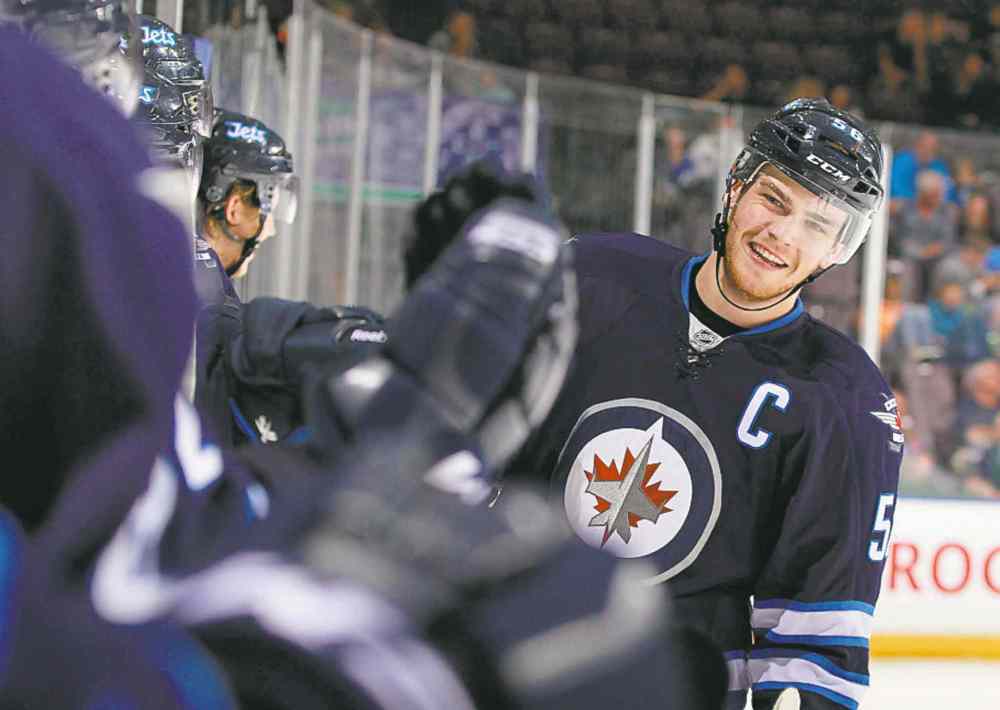 Jeff Vinnick
Jets captain Adam Lowry netted one of the Jets' five goals Sunday.