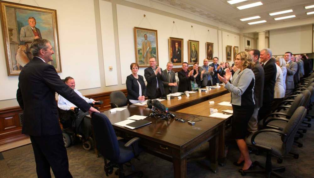 WAYNE GLOWACKI / WINNIPEG FREE PRESS
Premier-designate Brian Pallister arrives at the first full caucus meeting of a new Progressive Conservative government in the Manitoba Legislative Building on Wednesday.