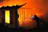TED GRANT / SPECIAL TO THE FREE PRESS
Free Press reader Ted Grant was trying to capture the fierce lightning last night when he noticed this garage to up in flames in the RM of Springfield.
