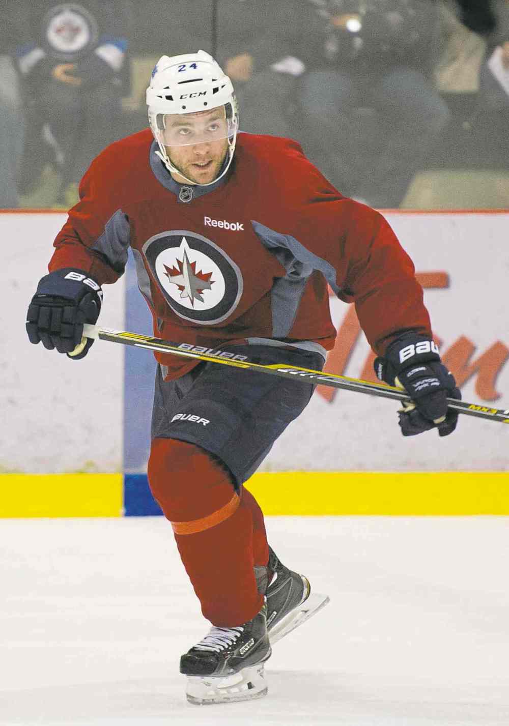 David Lipnowski / Winnipeg Free Press
Winnipeg Jets defenceman Grant Clitsome says he will soon be up to speed after missing much of last season with a back injury. He was flying over the ice during a workout at Jets Fan Fest at the MTS Iceplex Saturday morning.