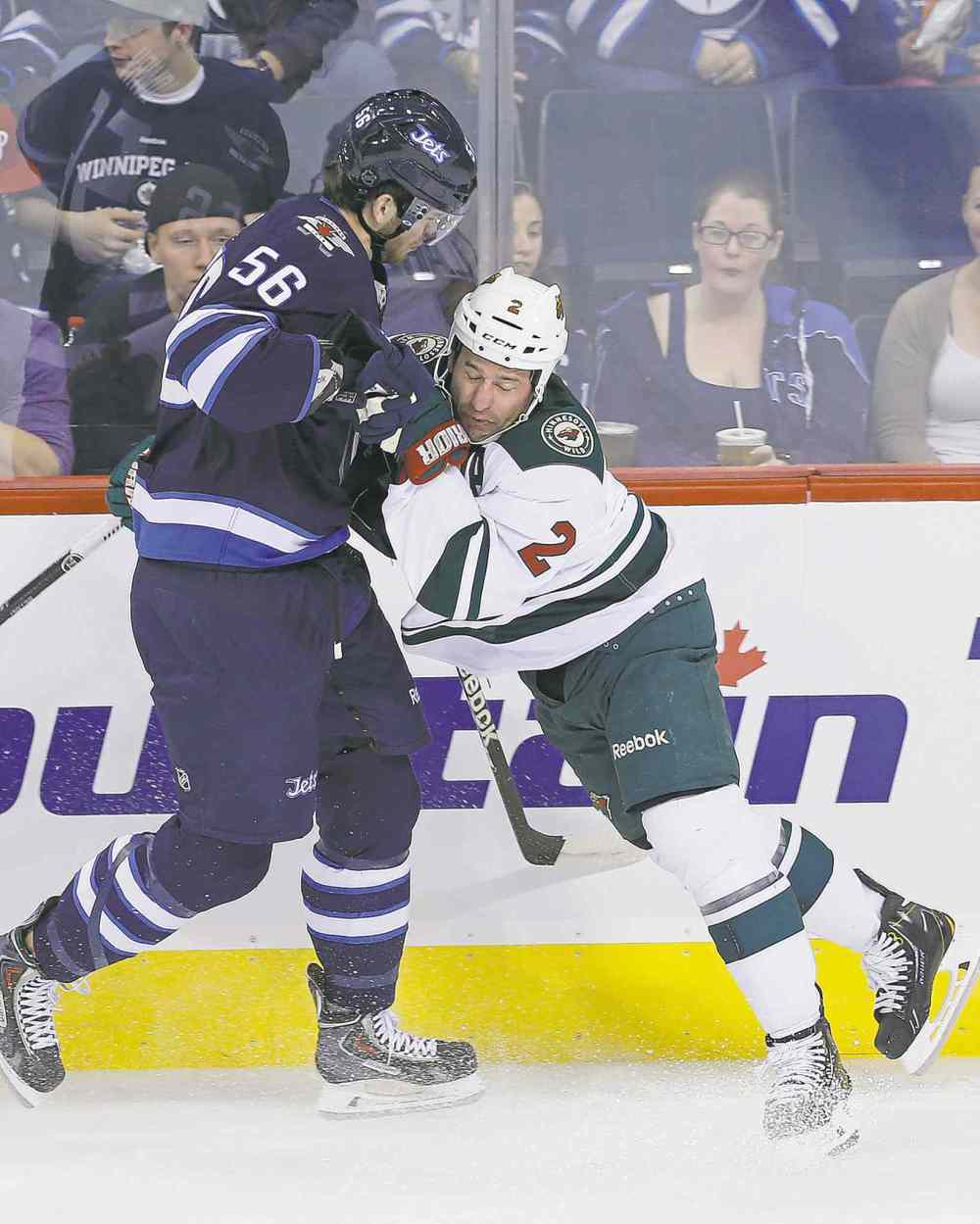 John Woods / WINNIPEG FREE PRESS
Adam Lowry wasn't afraid to use his 6-5, 201-pound frame to dish out some punishment Monday.