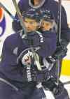 KEN GIGLIOTTI / WINNIPEG FREE PRESS 
Jim Slater (19) battles with Scott Kosmachuk during practice Tuesday at the MTS Centre.