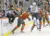 CP
Ann Heisenfelt / the associated press
Minnesota Wild defenceman Marco Scandella (left)  and Winnipeg Jets right-winger Blake Wheeler pursue the puck as linesman Jay Sharrers bails out Saturday night at Xcel Energy Center.