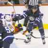TREVOR HAGAN / WINNIPEG FREE PRESS
Winnipeg Jets left-winger Evander Kane crushes Calgary Flame John Gaudreau in the third period of Saturday night�s game.