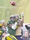 CP
photos by jason franson / the canadian press
Bombers receiver Rory Kohlert and the Eskimos� Alonzo Lawrence (6) battle for the throw during the second half Monday.