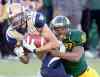 Jason Franson / THE CANADIAN PRESS
Winnipeg Blue Bombers Nick Moore (17) is tackled by Edmonton Eskimos Otha Foster (37) during second half action in Edmonton, Alta., on Monday.
