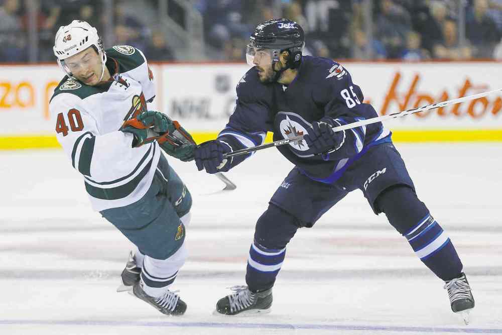 John Woods / WINNIPEG FREE PRESS Files
Jets centre Mathieu Perreault is very much accustomed to the energy at the MTS Centre, having played here as a Washington Capital, Anaheim Duck and Hershey Bear (AHL).