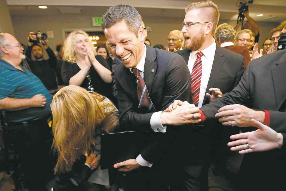 John Woods / THE CANADIAN PRESS
Brian Bowman greets supporters after his victory Wednesday night.