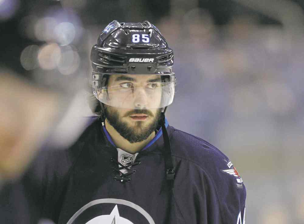 Joe Bryksa / Winnipeg Free Press files
Mathieu Perreault has been shifted to left wing from centre for the past three games and he's starting to get the hang of it.