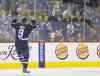 John Woods / the canadian press
Jets left-winger Evander Kane exhorts the crowd after duking it with Pittsburgh Penguin Simon Despres in the second period.
