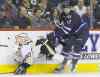 CP
Winnipeg centre Adam Lowry hammers Pittsburgh superstar Sidney Crosby during the second period of Thursday�s hard-hitting affair at the MTS Centre.