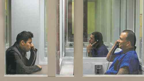 APTN
Andy Fraser (Eric Schweig, right) talks to his son Alan Fraser (Justin Rain) while in prison trying to elude a murder charge.