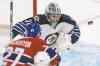 CP
paul CHIASSON / the canadian press
Winnipeg Jets goalie Ondrej Pavelec defects a shot as Montreal�s Alex Galchenyuk looks for the rebound during first-period action Tuesday.