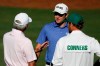 Fred Couples, left, talks with Corey Conners at the practice area for the Masters golf tournament Wednesday, April 10, 2019, in Augusta, Ga. (AP Photo/Marcio Jose Sanchez)