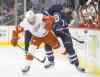 CP
John Woods / the canadian press
Detroit�s Brian Lashoff and Winnipeg�s Adam Lowry fight for a loose puck during second-period action at the MTS Centre Thursday night.