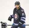 BORIS MINKEVICH / WINNIPEG FREE PRESS files
Veteran forward Mathieu Perreault is expected to draw back into the lineup after missing Wednesday's game in Buffalo with a suspected shoulder injury.