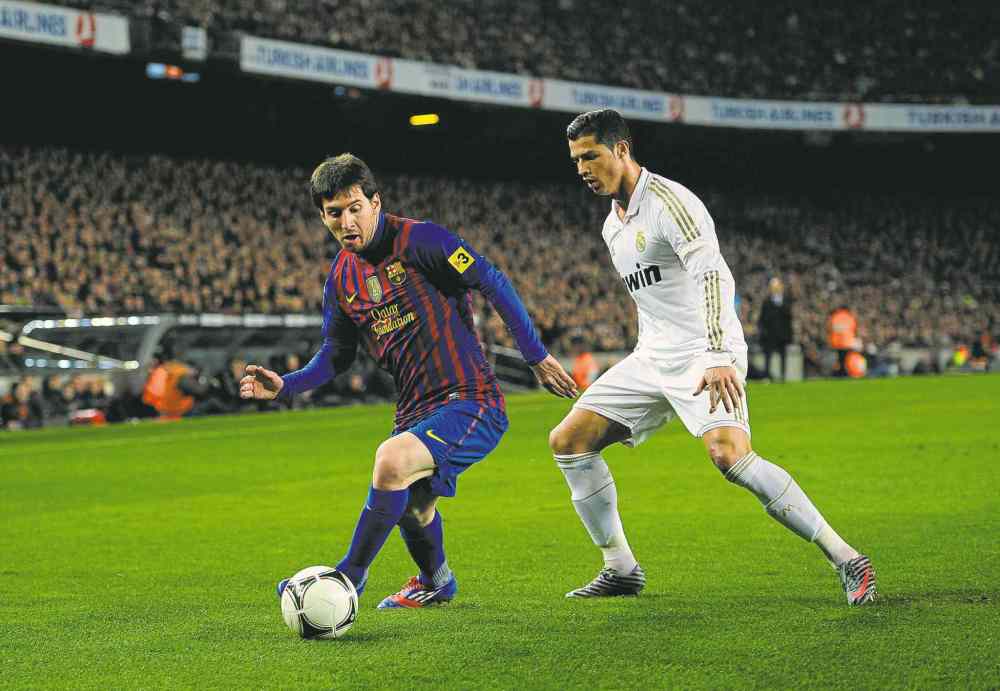 Manu Fernandez / Associated press Files
FC Barcelona's Lionel Messi (left) and Real's Cristiano Ronaldo are among the candidates for soccer's most prestigious award.