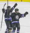 MIKE DEAL / WINNIPEG FREE PRESS
MIKE DEAL / WINNIPEG FREE PRESS
Overtime hero Mathieu Perreault (right) celebrates his game-winning goal with linemate Evander Kane Wednesday night at the MTS Centre.