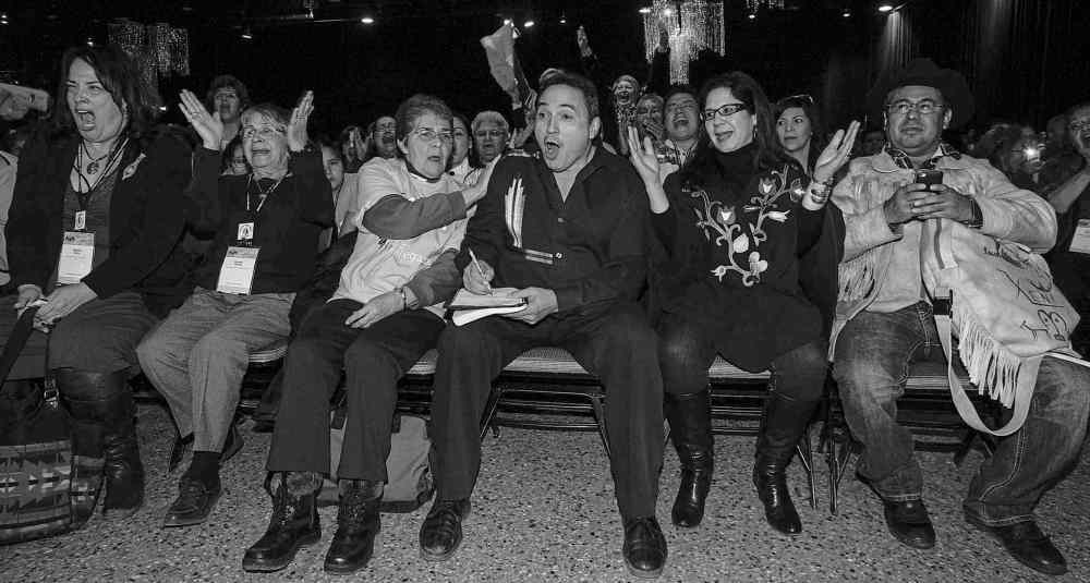 MIKE DEAL / WINNIPEG FREE PRESS
Newly elected national chief Perry Bellegarde (above and top) reacts to his victory with fiancée Val Galley (right) and supporter Marianna Couchie, chief of Nipissing First Nation in Ontario.