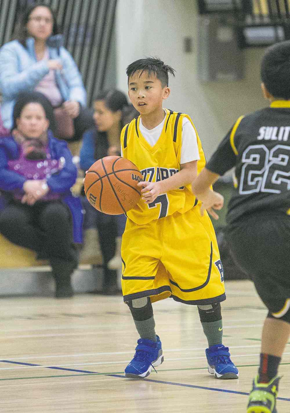 MIKE DEAL / WINNIPEG FREE PRESS
MIKE DEAL / WINNIPEG FREE PRESS
Andrei Capucion was one of about 1,000 players who competed in the opening day of Winnipeg�s Philippine Basketball Association.