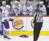 John Woods / The Canadian Press
The Maple Leafs try to ignore a jersey thrown on the ice by one of their disgruntled fans during their 5-1 loss Saturday.