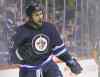 CP
John Woods / the canadian press files
The Jets� Dustin Byfuglien started the season as a forward, but has now been selected an NHL all-star at defence, his preferred position.