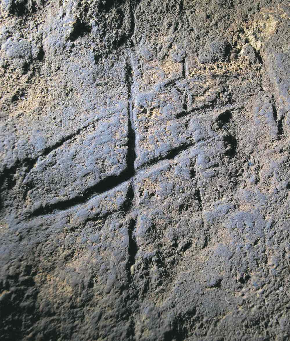 The Associated Press
A Neanderthal rock engraving in Gibraltar. The series of lines could be proof that Neanderthals were more intelligent and creative than previously thought.