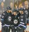Melissa Tait / Winnipeg Free Press files
Blake Wheeler (left), Bryan Little (middle) and Andrew Ladd are among the top point producers and also have some of the best possession numbers.