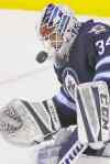 John Woods / The Canadian Press Files
Michael Hutchinson has better numbers than his partner Ondrej Pavelec, but teammates insist it doesn't matter who is between the pipes.